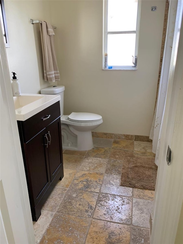 1409 Yorkshire St, Port Charlotte, FL 33952 - bathroom with stone tile flooring and vanity