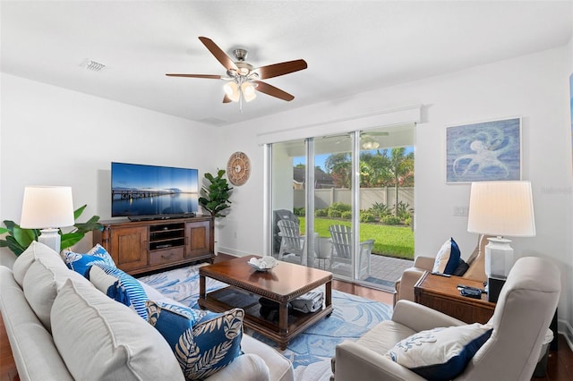 1181 Castlevecchio Loop, Orlando, FL 32825 - living room with ceiling fan and wood finished floors