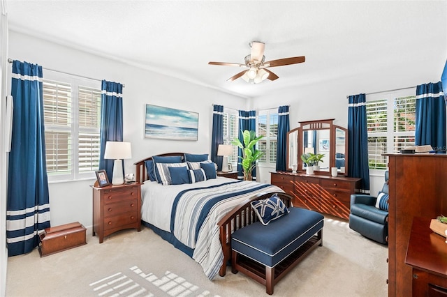 1181 Castlevecchio Loop, Orlando, FL 32825 - bedroom featuring multiple windows, carpet, and a ceiling fan