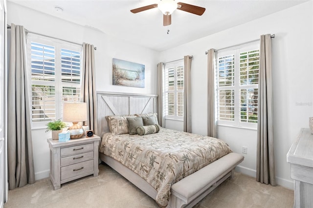 1181 Castlevecchio Loop, Orlando, FL 32825 - bedroom featuring light carpet and ceiling fan