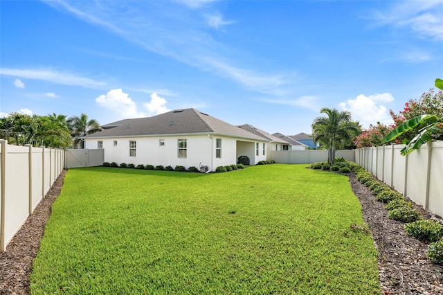 1181 Castlevecchio Loop, Orlando, FL 32825 - back of property featuring a fenced backyard and stucco siding