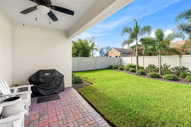 1181 Castlevecchio Loop, Orlando, FL 32825 - fenced backyard featuring ceiling fan and a patio area