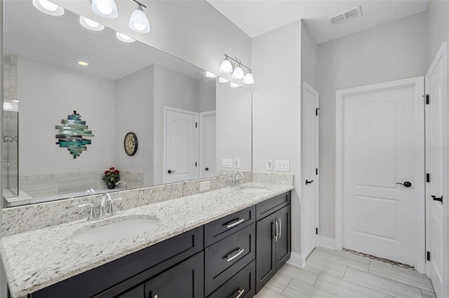 100 Verde Way, Debary, FL 32713 - full bathroom featuring double vanity and baseboards
