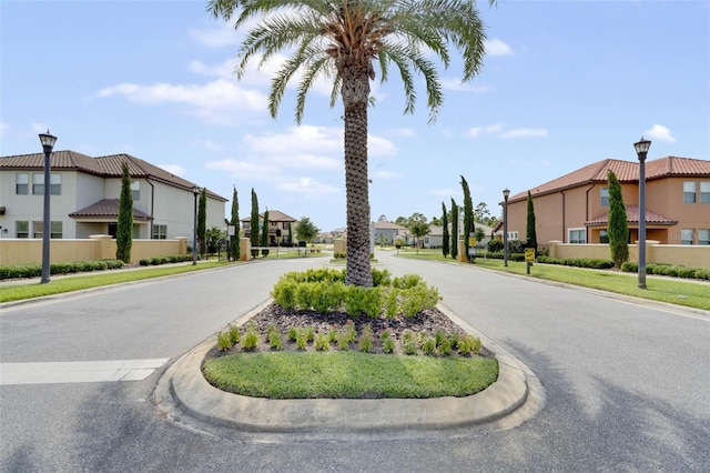 100 Verde Way, Debary, FL 32713 - view of asphalt street with street lighting, a residential view, curbs, and sidewalks