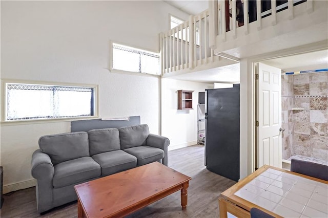 12350 83rd St, Fellsmere, FL 32948 - living room with wood finished floors and a high ceiling