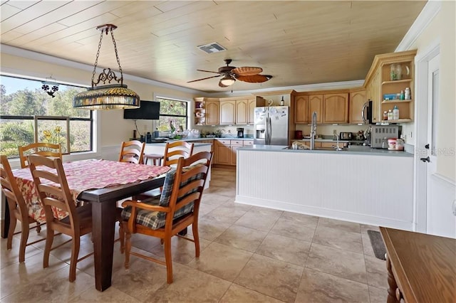 12350 83rd St, Fellsmere, FL 32948 - dining area featuring ornamental molding, a ceiling fan, wood ceiling, and light tile patterned floors