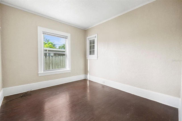 1215 6th St, Clermont, FL 34711 - empty room with ornamental molding and wood finished floors