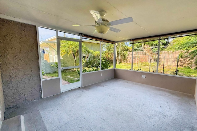 1215 6th St, Clermont, FL 34711 - unfurnished sunroom with healthy amount of natural light and ceiling fan
