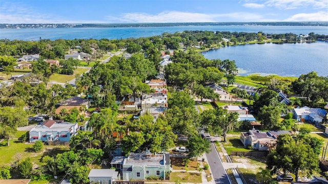 1215 6th St, Clermont, FL 34711 - aerial view of residential area featuring a large body of water