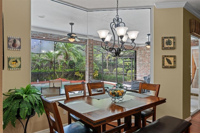 11613 Swift Water Cir, Orlando, FL 32817 - dining area with a chandelier, wood finished floors, and a ceiling fan