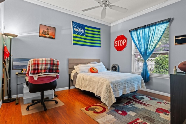 11613 Swift Water Cir, Orlando, FL 32817 - bedroom featuring crown molding, wood finished floors, and ceiling fan