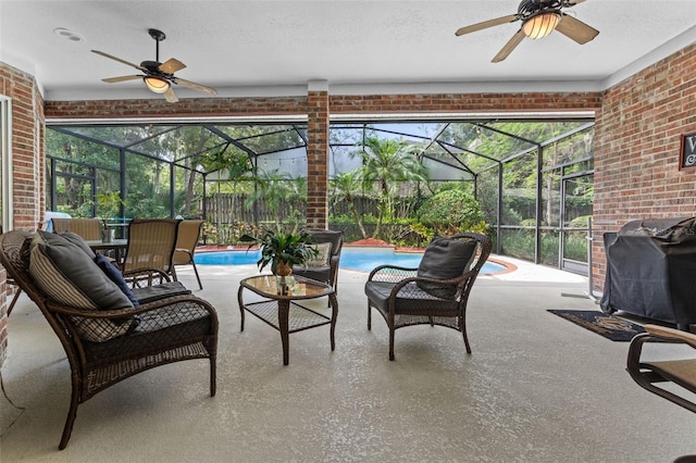 11613 Swift Water Cir, Orlando, FL 32817 - view of patio / terrace with a ceiling fan, grilling area, and a lanai