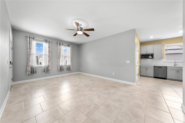 2412 Camden Park Ave, Davenport, FL 33837 - empty room featuring plenty of natural light, a ceiling fan, light tile patterned floors, and recessed lighting