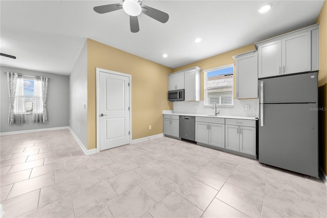 2412 Camden Park Ave, Davenport, FL 33837 - kitchen with appliances with stainless steel finishes, ceiling fan, healthy amount of natural light, gray cabinetry, and recessed lighting