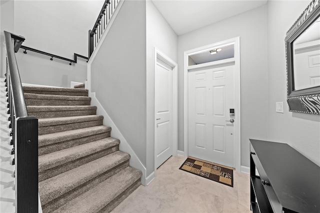 2412 Camden Park Ave, Davenport, FL 33837 - foyer entrance with stairs and light marble finish floors