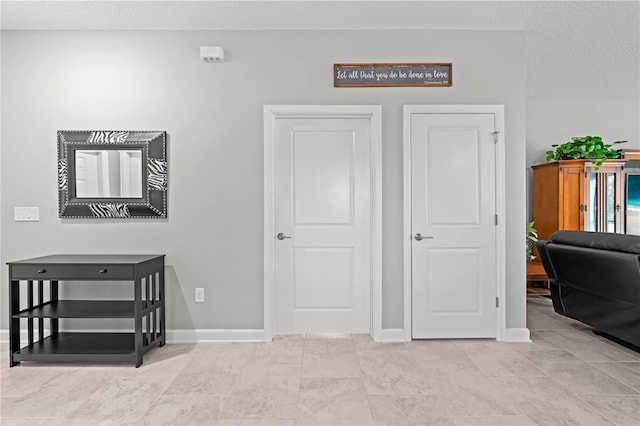 2412 Camden Park Ave, Davenport, FL 33837 - bedroom with baseboards and light tile patterned floors