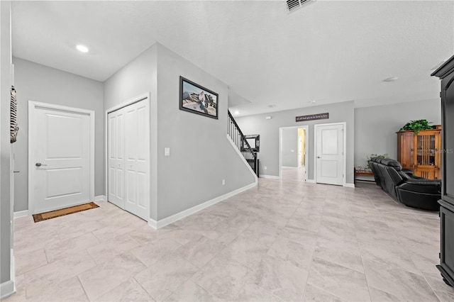 2412 Camden Park Ave, Davenport, FL 33837 - foyer featuring stairway and baseboards