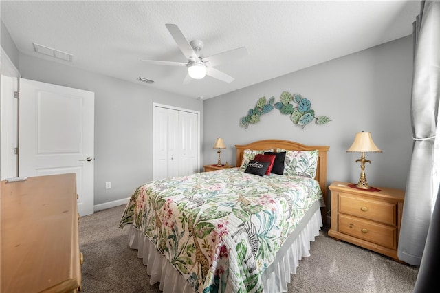 2412 Camden Park Ave, Davenport, FL 33837 - bedroom featuring carpet, a closet, and ceiling fan