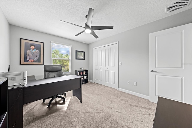 2412 Camden Park Ave, Davenport, FL 33837 - office space featuring ceiling fan, light carpet, and a textured ceiling