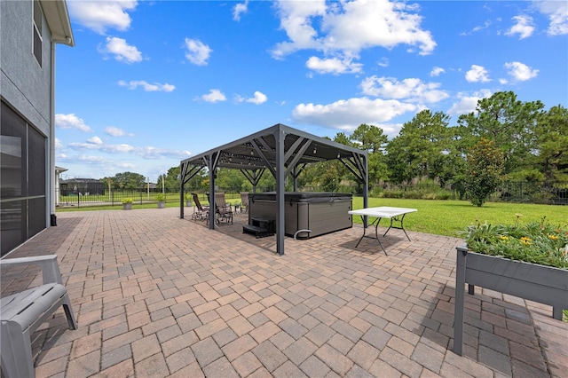 2412 Camden Park Ave, Davenport, FL 33837 - fenced backyard with a hot tub, a patio, and a gazebo