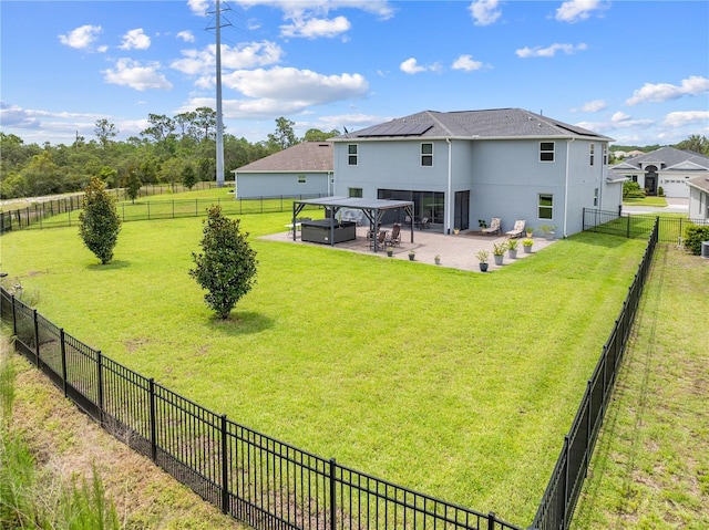 2412 Camden Park Ave, Davenport, FL 33837 - rear view of house featuring a jacuzzi, a patio area, a fenced backyard, and stucco siding