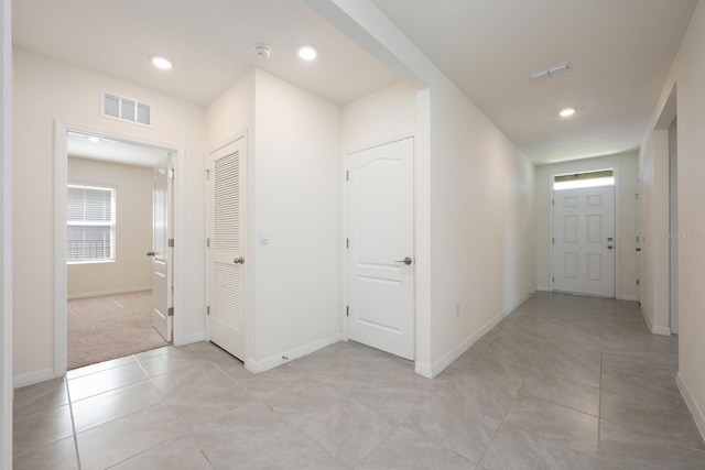 3241 Silas Dr, New Smyrna Beach, FL 32168 - hallway featuring recessed lighting and light tile patterned flooring