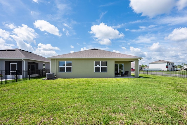 3241 Silas Dr, New Smyrna Beach, FL 32168 - rear view of house featuring stucco siding, a patio area, and a fenced backyard