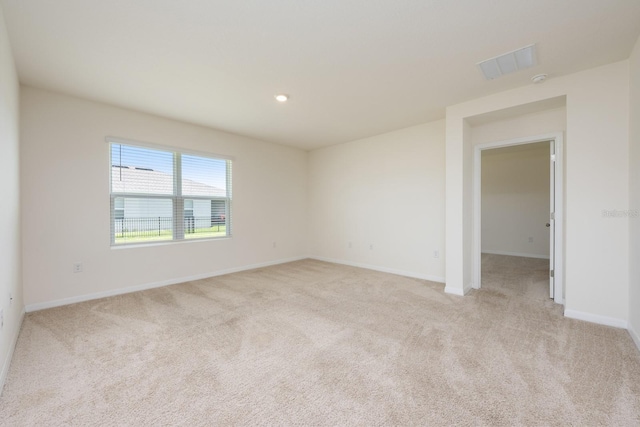 3241 Silas Dr, New Smyrna Beach, FL 32168 - spare room with light carpet