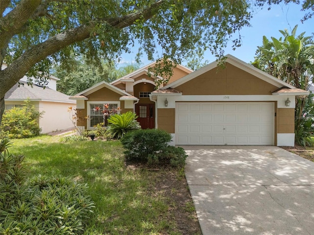 1048 Woodsong Way, Clermont, FL 34714 - view of front of home with concrete driveway, an attached garage, stucco siding, and a front yard