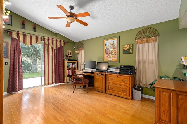1048 Woodsong Way, Clermont, FL 34714 - home office featuring ceiling fan, light wood-style flooring, a textured ceiling, and lofted ceiling