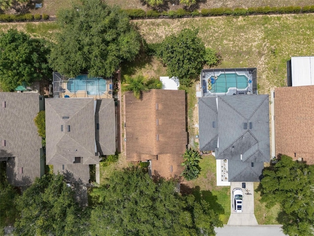 1048 Woodsong Way, Clermont, FL 34714 - aerial view of a pool area