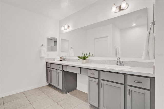 554 Pawnee Ct, Haines City, FL 33844 - bathroom featuring double vanity and tile patterned flooring