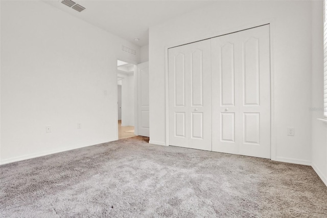 554 Pawnee Ct, Haines City, FL 33844 - unfurnished bedroom with carpet and a closet