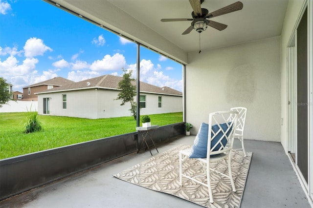 554 Pawnee Ct, Haines City, FL 33844 - sunroom featuring a ceiling fan