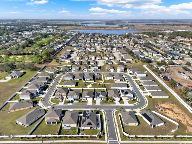 554 Pawnee Ct, Haines City, FL 33844 - aerial view of property's location featuring a nearby body of water and nearby suburban area