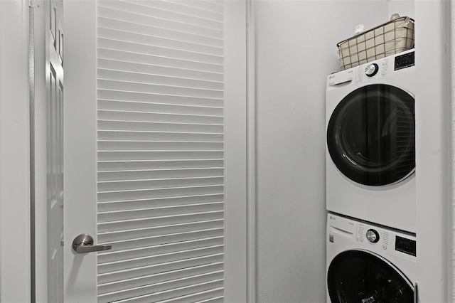 1100 Delaney Ave Unit F407, Orlando, FL 32806 - washroom with estacked washer and dryer
