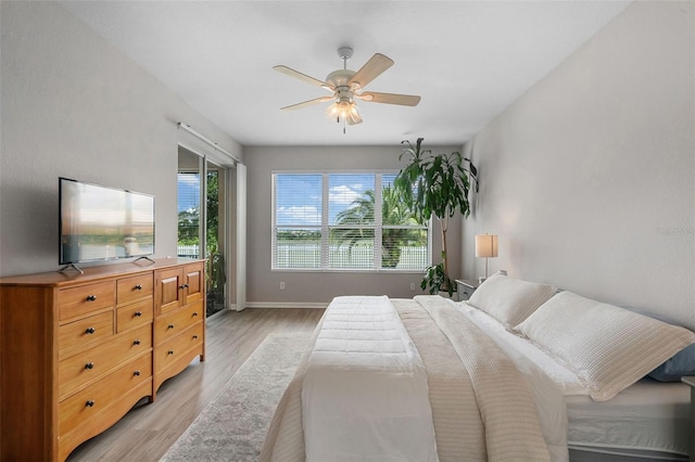 594 Hernando Pl, Clermont, FL 34715 - bedroom featuring light wood-type flooring and ceiling fan