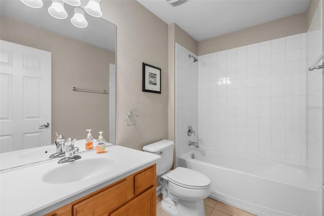 594 Hernando Pl, Clermont, FL 34715 - full bath with vanity, tile patterned floors, bathtub / shower combination, and a textured wall