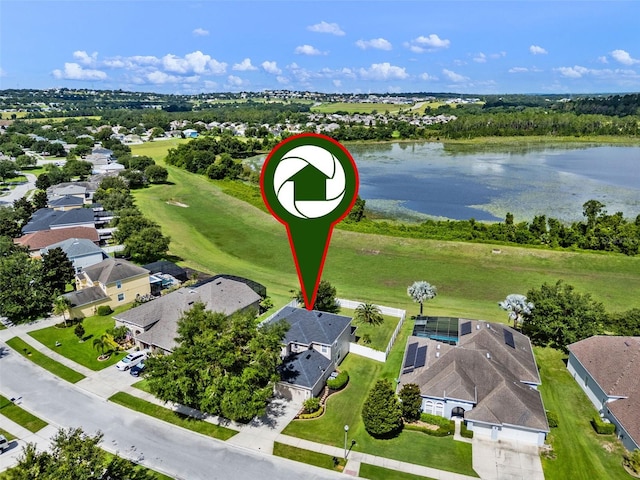 594 Hernando Pl, Clermont, FL 34715 - aerial perspective of suburban area with a large body of water