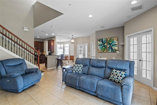 2122 Bent Grass Ave, Ocoee, FL 34761 - living room with light tile patterned flooring, french doors, recessed lighting, and stairs
