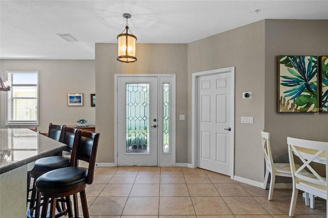2122 Bent Grass Ave, Ocoee, FL 34761 - entryway featuring light tile patterned floors and baseboards
