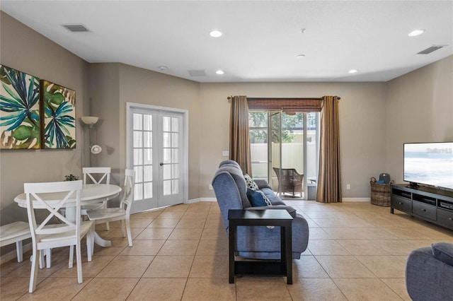 2122 Bent Grass Ave, Ocoee, FL 34761 - living area featuring light tile patterned flooring, french doors, and recessed lighting