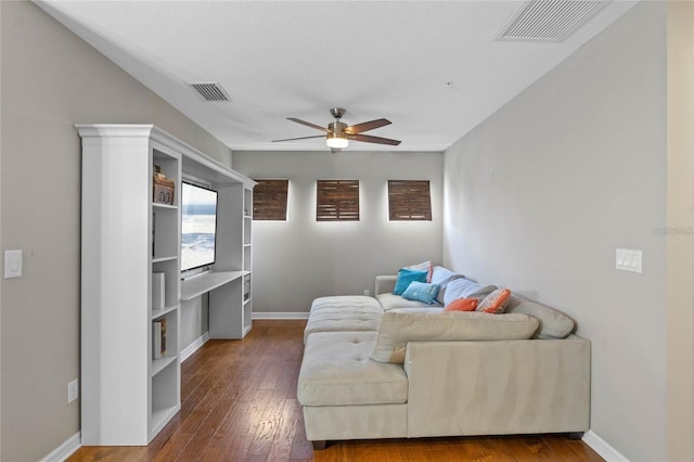 2122 Bent Grass Ave, Ocoee, FL 34761 - living area featuring a ceiling fan and dark wood finished floors