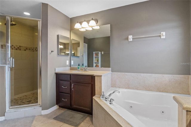 2122 Bent Grass Ave, Ocoee, FL 34761 - bathroom featuring a shower stall, vanity, a jetted tub, and tile patterned floors