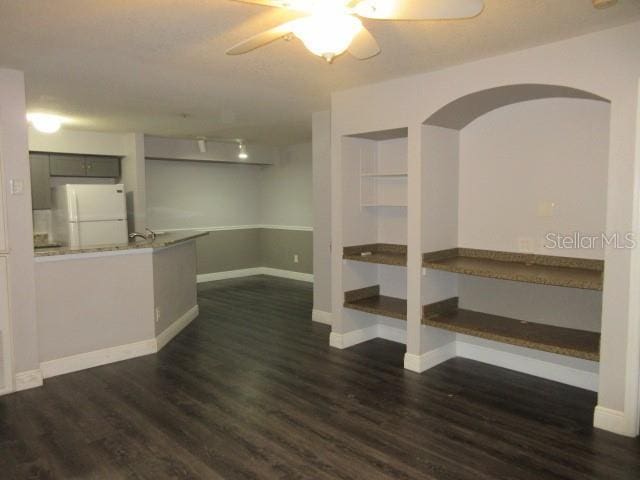 831 Camargo Way Unit 106, Altamonte Springs, FL 32714 - interior space with dark wood-type flooring, a ceiling fan, and arched walkways