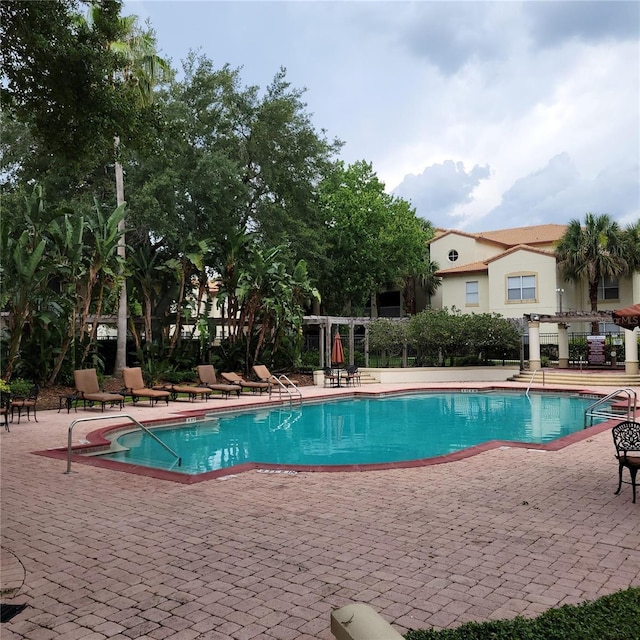 831 Camargo Way Unit 106, Altamonte Springs, FL 32714 - community pool featuring a patio
