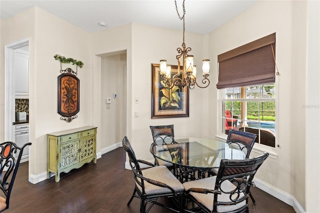 8424 Lake Burden Cir, Windermere, FL 34786 - dining room with a chandelier and dark wood-style floors