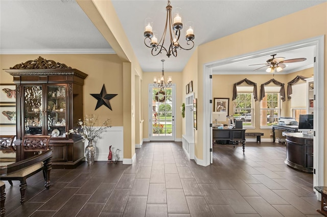 8424 Lake Burden Cir, Windermere, FL 34786 - entrance foyer featuring a chandelier, healthy amount of natural light, a ceiling fan, ornamental molding, and dark wood-style floors