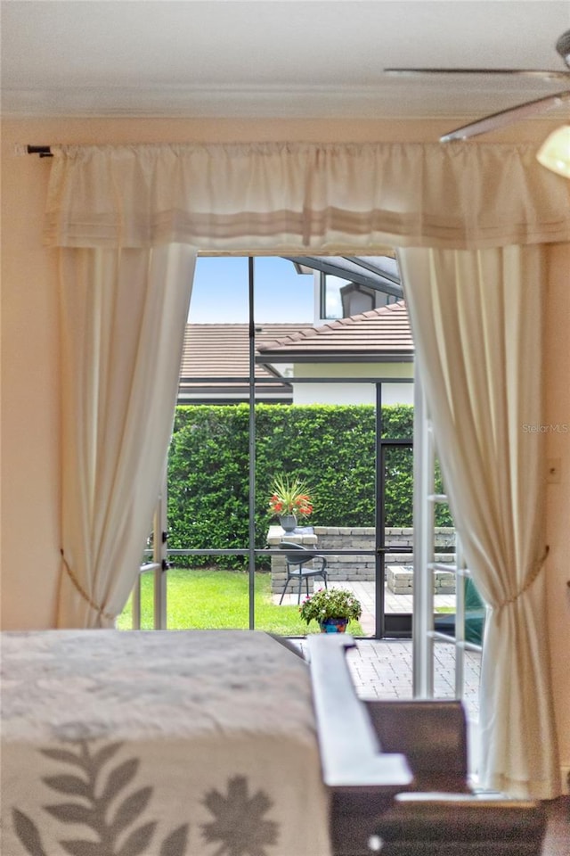 8424 Lake Burden Cir, Windermere, FL 34786 - bedroom featuring ornamental molding and access to exterior