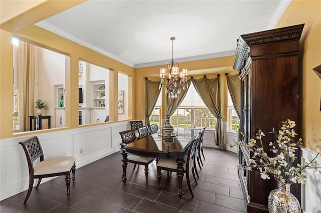 8424 Lake Burden Cir, Windermere, FL 34786 - dining area with ornamental molding and a chandelier